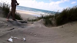Exhibitionist Strokes Hard on the Beach