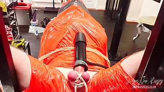 Merciless Cock Milking (tight Shiny Red Plastic Mummificaton and Remote Anal Stimulation)