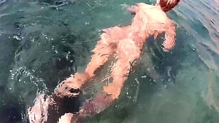 Big breasted MILF seductress posing naked underwater