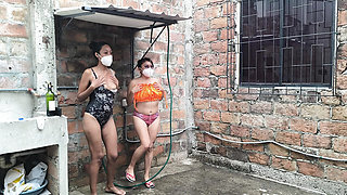 They wet their mature and sexualized bodies in their neighborhood's shower.