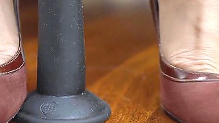 Blonde MILF Plays with a Dildo Using Her Oiled Feet Like a True Foot Goddess
