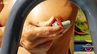 Nippleringlover Horny Milf Masturbating Outdoors In Pool Inserting Huge Screws In Extreme Stretched Pierced Nipples