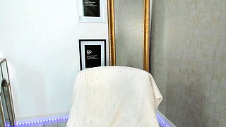 Busty curly brunette with big boobs fucks on couch