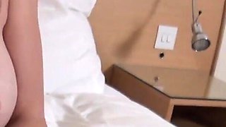 Playing on the bed with my sex toy