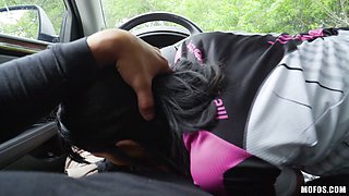 tempting chick looks amazing while sucking dick in a car