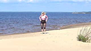 Funny MILF with Nylon Ass and Tits on Beach