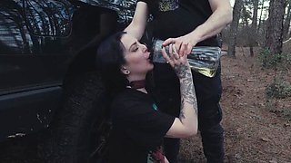 Submissive beauty eats booty and piss at roadside picnic, then gets rough face fucking