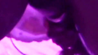 Young Girl Using Her Feet to Play with the Dildo While Masturbating