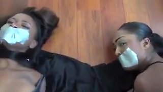 Two african bitches stripped and gagged