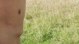 Walking in the meadow without clothes