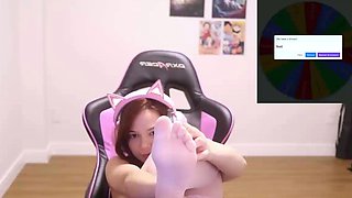 Petite redhead enjoys foot fetish session