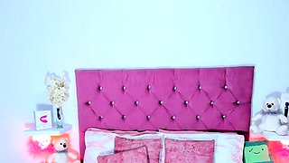 Small titted brunette Sharron with glasses masturbates