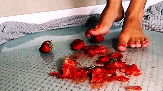 Amateur femdom mistress crushing strawberries barefoot