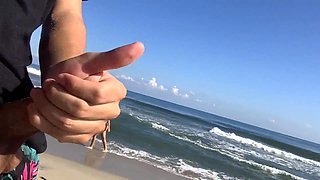 I jerk off on the beach while watching two sexy girls in the sea who decide to help me