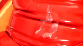 slut in red latex cat suit fucked cum on latex