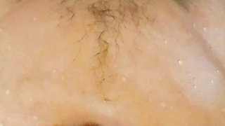 I was taking a shower while masturbating suddenly my man came in and looked at my whole body
