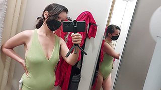Inexperienced wife Mirsur tries on lingerie in the fitting room, showing off her big nipples and hairy booty