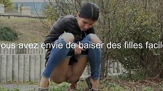 Une pisseuse urine pres dun immeuble