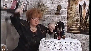 Ginger granny is pleasuring a younger dude's dong