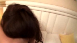 Tanned oiled brunette with big boobs fingers her shaved vag