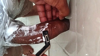 Cum during shaving of big cock