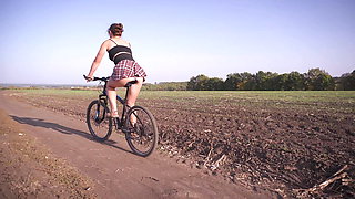 Schoolgirl 18+ Rides A Bike Under Skirt White Panties