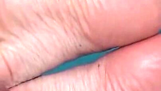 Hot MILF in Amazing Footjob POV