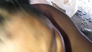 Horny Dominican sucking cock in the bathroom