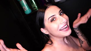 Kaitlyn Katsaros enjoys intense action through a glory hole, showcasing her petite frame.