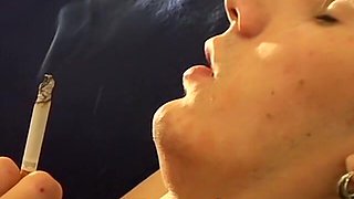 Hung Antony puffs his cigarette while stroking his big dick