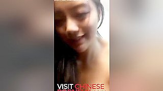 Skinny Chinese camgirl fucks in maid outfit