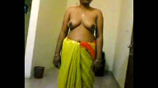 Lewd amateur Indian housewife flashes her ugly natural titties