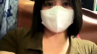 Teen on the bus hinting at showing breasts and being sensual