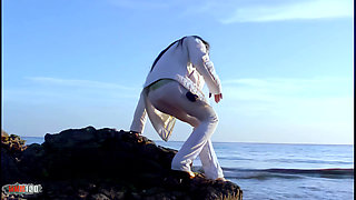 Pretty with Big Tits Christine Doing a Strip on the Beach