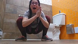 Nerdy Faery's Piss Fetish: Amateur Canadian Babe Peeing in Public Toilet