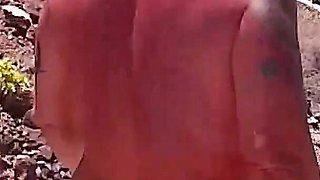 Couple Is Hiking Naked Near the Coast