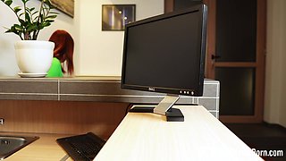 Humping a redhead behind her working desk