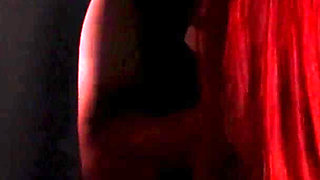 Redhead nurse sucks cock at a gloryhole