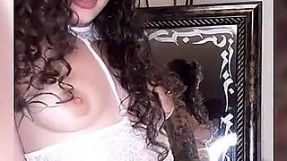 Petite brunette with tattoos masturbates