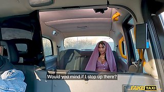 Yasmina Khan, the busty nurse, gets her tight Asian pussy drilled by a huge cock in fake taxi