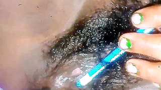 Geeta Bhabhi having sex with a pencil in a dark room