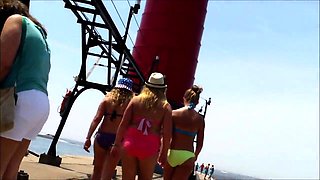 Beach voyeur follows gorgeous young babes in sexy bikinis