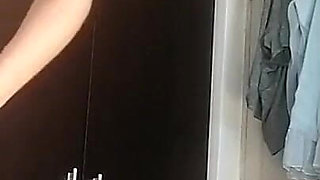 Amateur Wife Dancing Naked at Home. Amateur Woman Has Fun Trying on Clothes and Cutting Them.