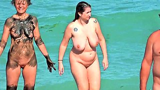 Shameless amateur fisted on a public beach