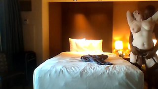 Cuckold watches insatiable wife go black in hotel room