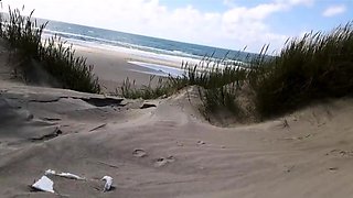 Exhibitionist Strokes Hard on the Beach