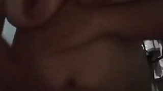 Squeezing The Breasts After Showering