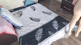 Sensual massage of a sexy couple with oil on the body. Foreplay in the bedroom with an amateur couple.