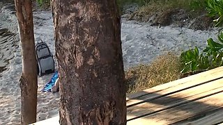 Ashlyn Lee goes fishing, but she would rather enjoy a masturbation session on the sand. She gets caught on-camera by our voyeur videographer.