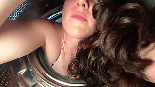 A hot brunette girlfriend gets stuck and banged in a washing machine